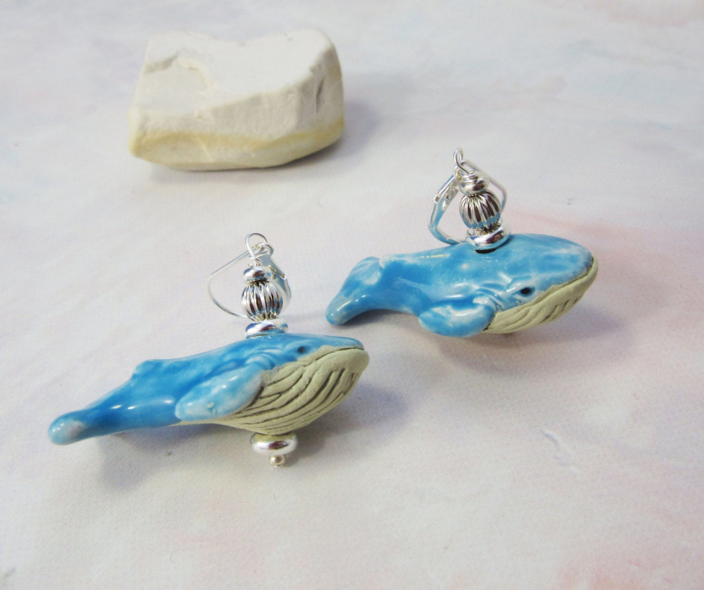 Close-up of hand-painted Whale Earrings Big Blue, showcasing intricate details and vibrant colors, ideal for ocean-themed accessories.