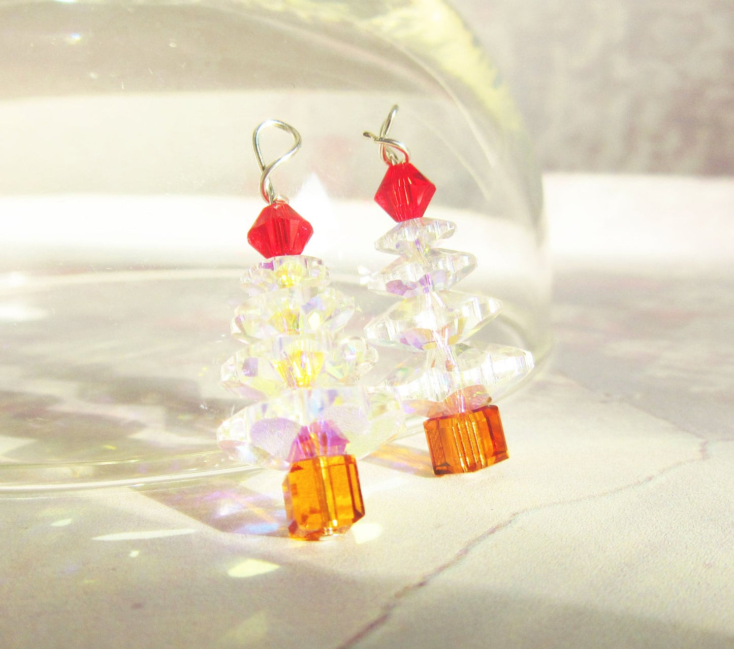 Christmas Tree Earrings - Authentic Crystal drop earrings displayed on a festive background, ideal for holiday gifting.