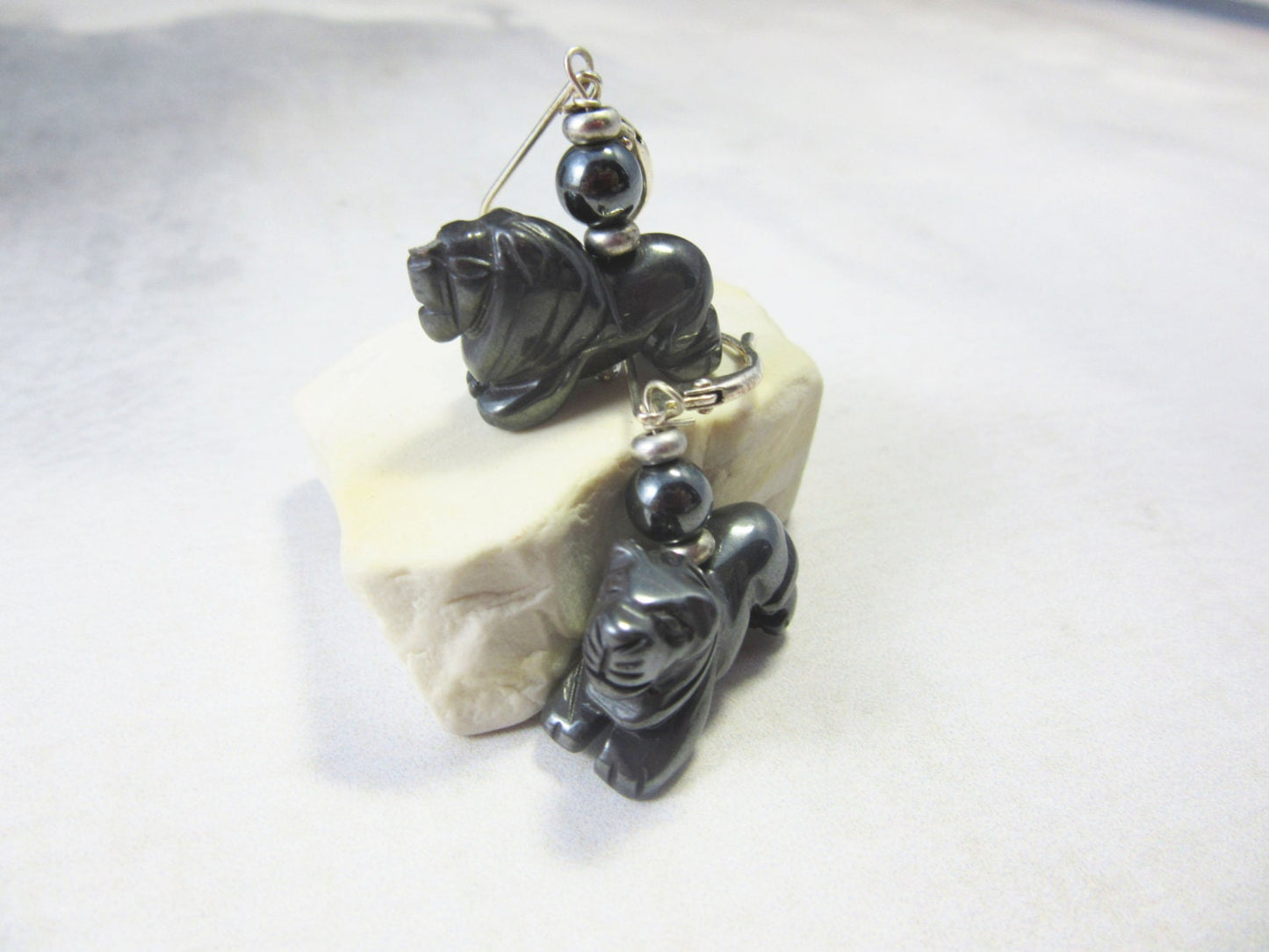 Lion Earrings, Carved Hematite Earrings showcasing intricate lion designs, perfect for animal lovers and zoo enthusiasts.
