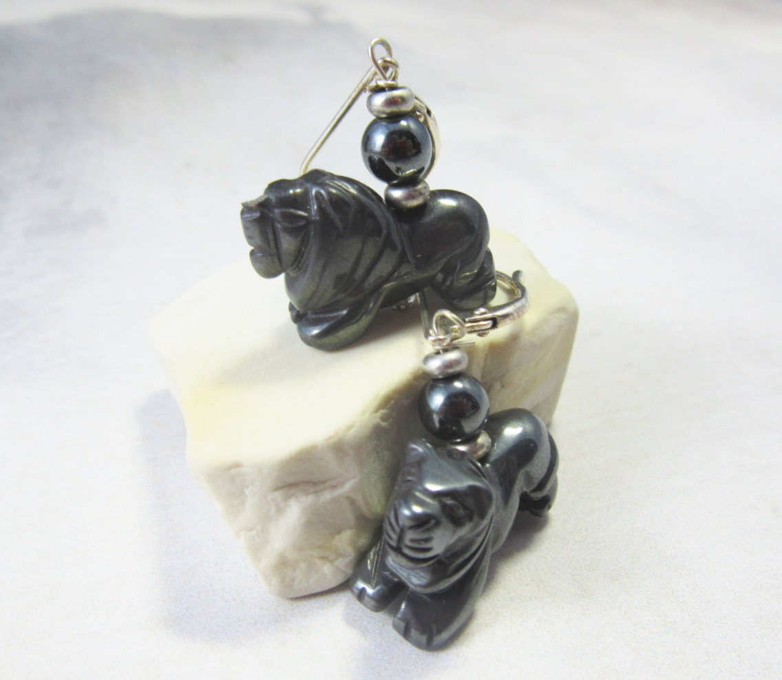 Lion Jewelry, Animal Themed Gift, featuring distinctive carved hematite lion earrings, ideal for safari guides or mammologists.
