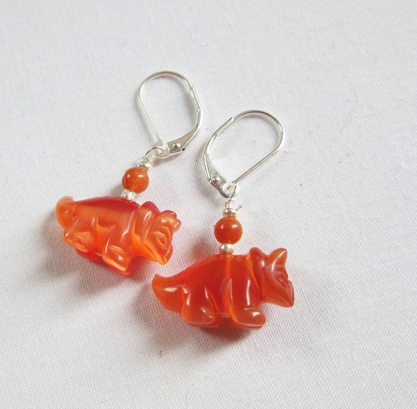 Triceratops earrings, blue dinosaur earrings, fun and quirky dinosaur jewelry perfect as a silly gift.