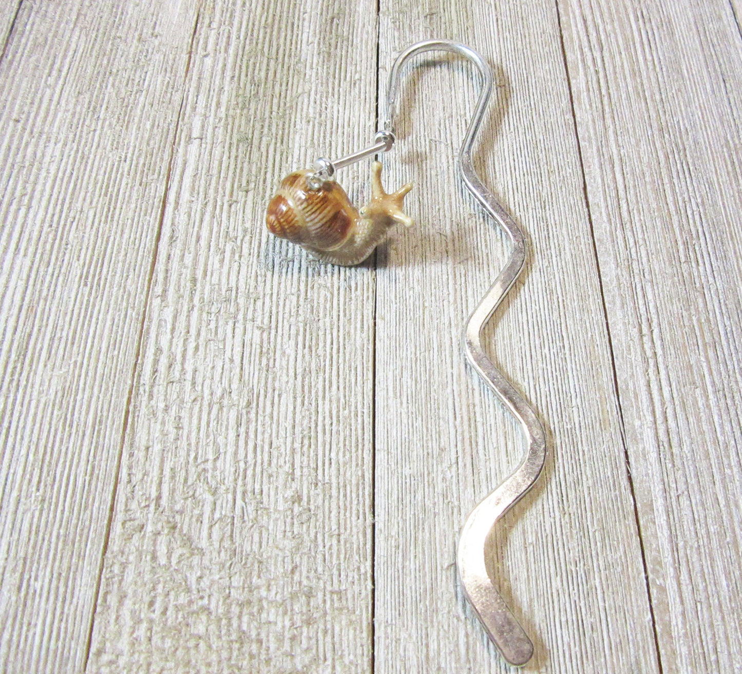 Snail bookmark - a unique bookmark gift for garden lovers, designed with a delicate porcelain snail and slim profile for easy use.