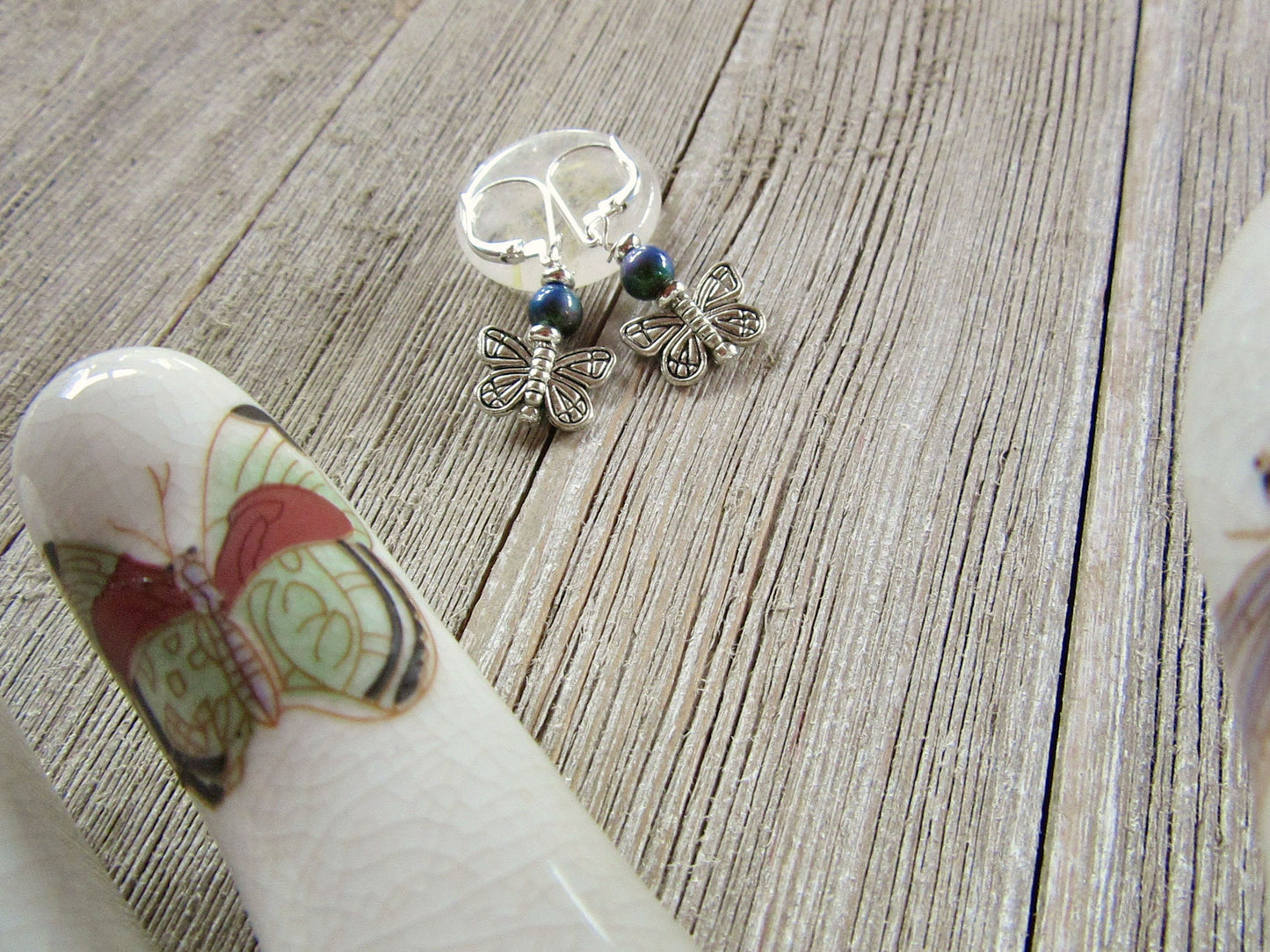 Butterfly earrings - beautiful mood bead jewelry capturing the essence of nature, featuring delicate dangle style, perfect for gifting.