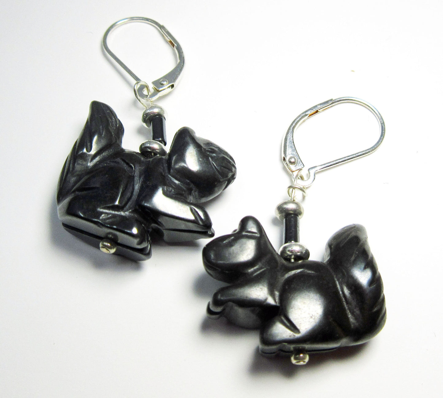 Close-up of Squirrel Earrings showcasing intricate design and earthy colors, perfect for quirky friends and animal enthusiasts.