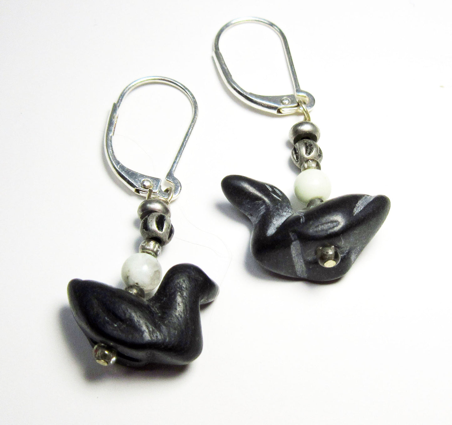 Carved stone earrings inspired by songbirds including a duck and goose, ideal accessory for nature lovers and bird watchers.