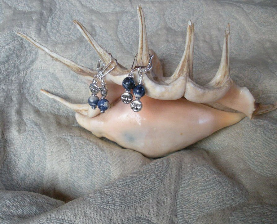 Stylish packaging of Blue Moon Sodalite Earrings ready as a mindful gift, promoting peace and gratitude with its unique design and healing properties.