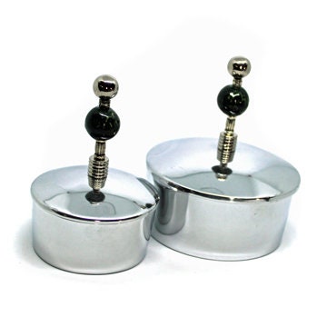 Matching spoon for the stainless steel bowl set, designed for serving condiments and enhancing any table setting