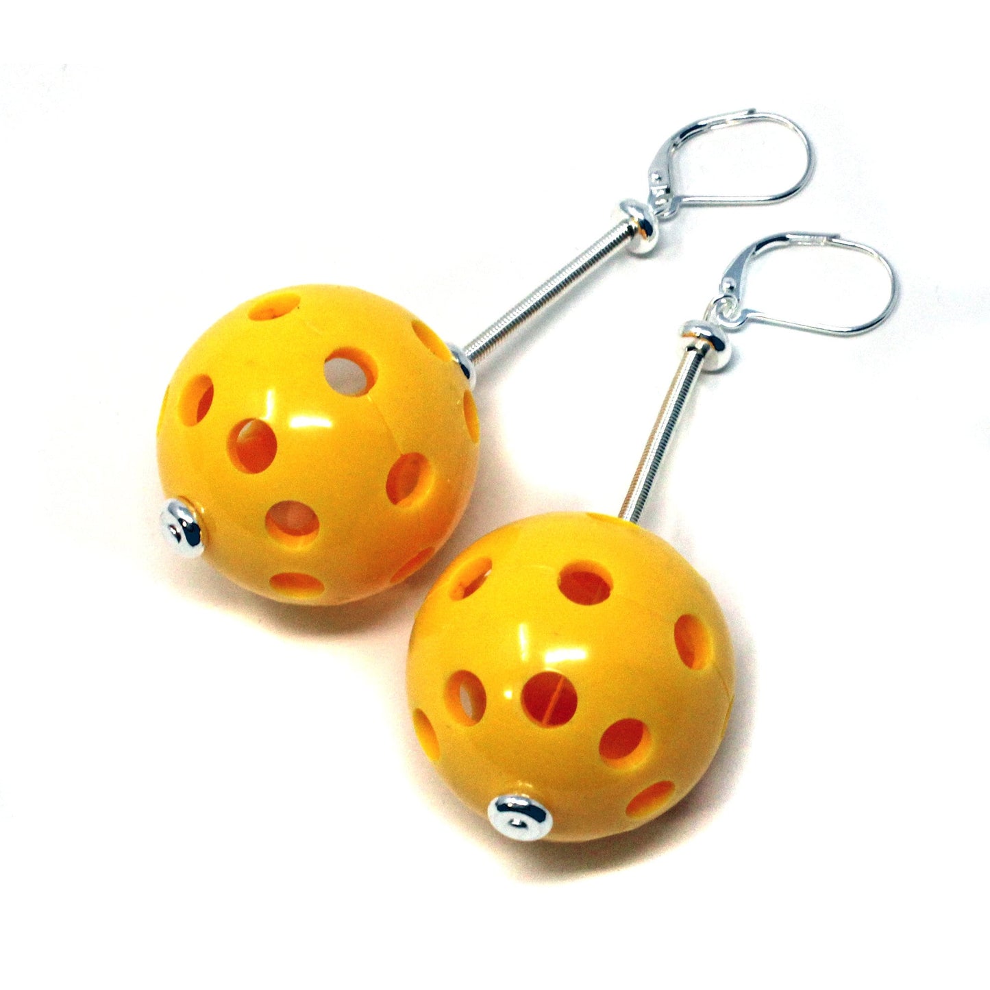 PICKLEBALL EARRINGS - Colorful pickleball earrings in lime green, red, yellow, and blue, perfect for wearing on the court or out.
