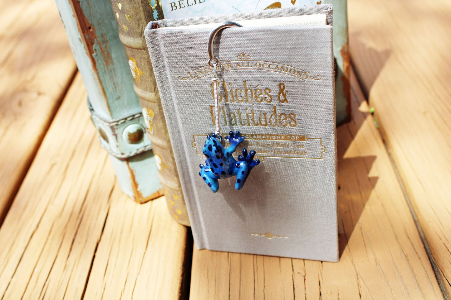 Arrow Frog Blue Bookmark - Beautiful porcelain figurine bookmark featuring a blue dart frog, perfect for frog lovers and readers.