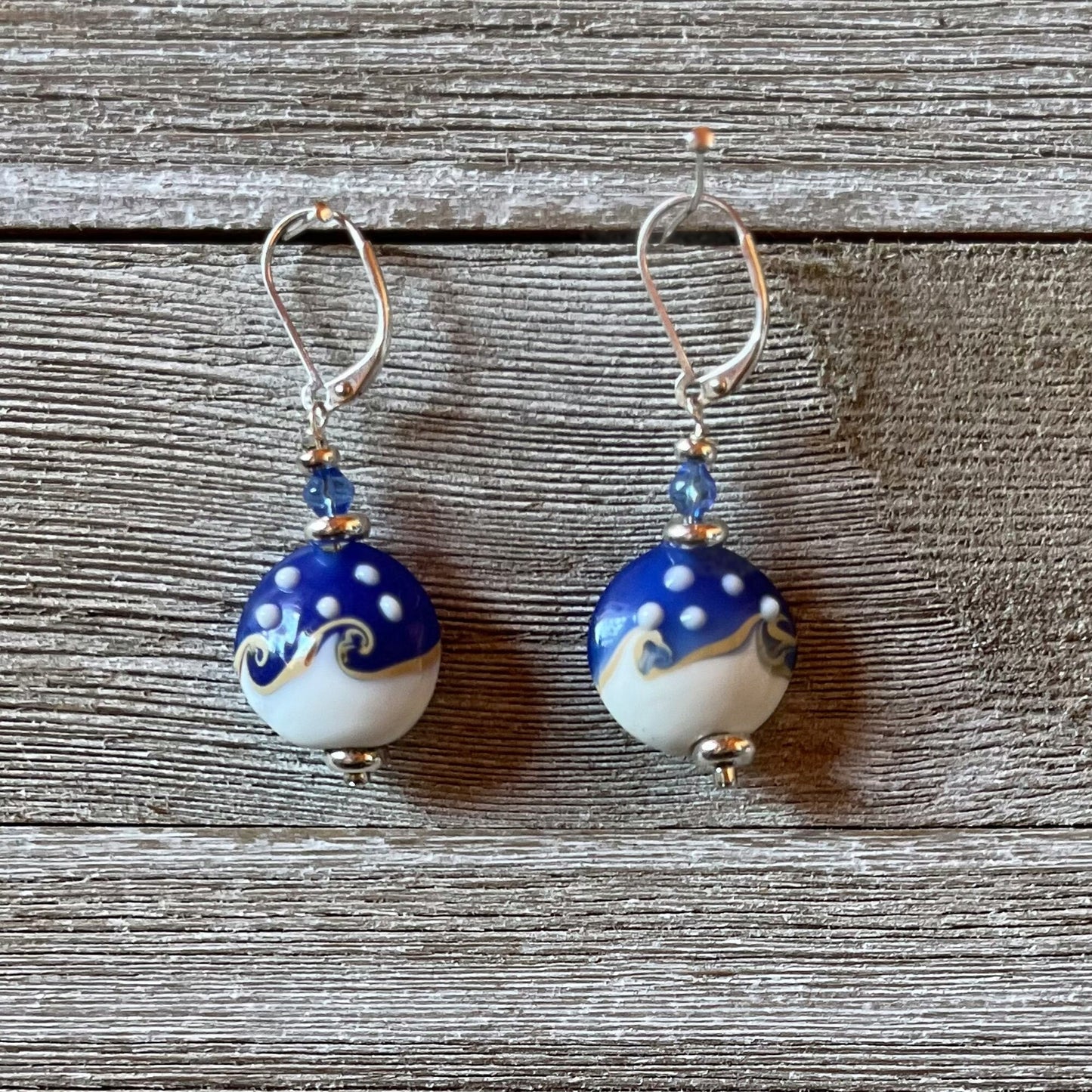Ocean Wave Earrings say Hello - beautiful lamp worked glass earrings designed for ocean lovers, featuring blue and white swirls that mimic the ocean.