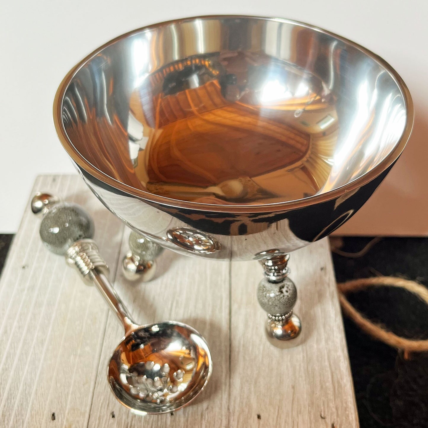 Stylish Modern Stainless Steel Bowl Set with gray ceramic legs and olive spoon, ideal for serving dips and salsas.