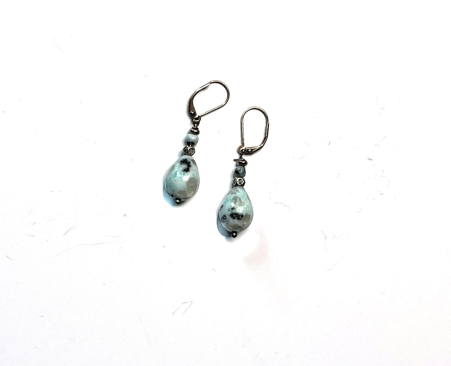 Close-up of Teardrop Earrings in sesame jasper, highlighting the mint jasper and black tourmaline elements, perfect for everyday minimalist jewelry.
