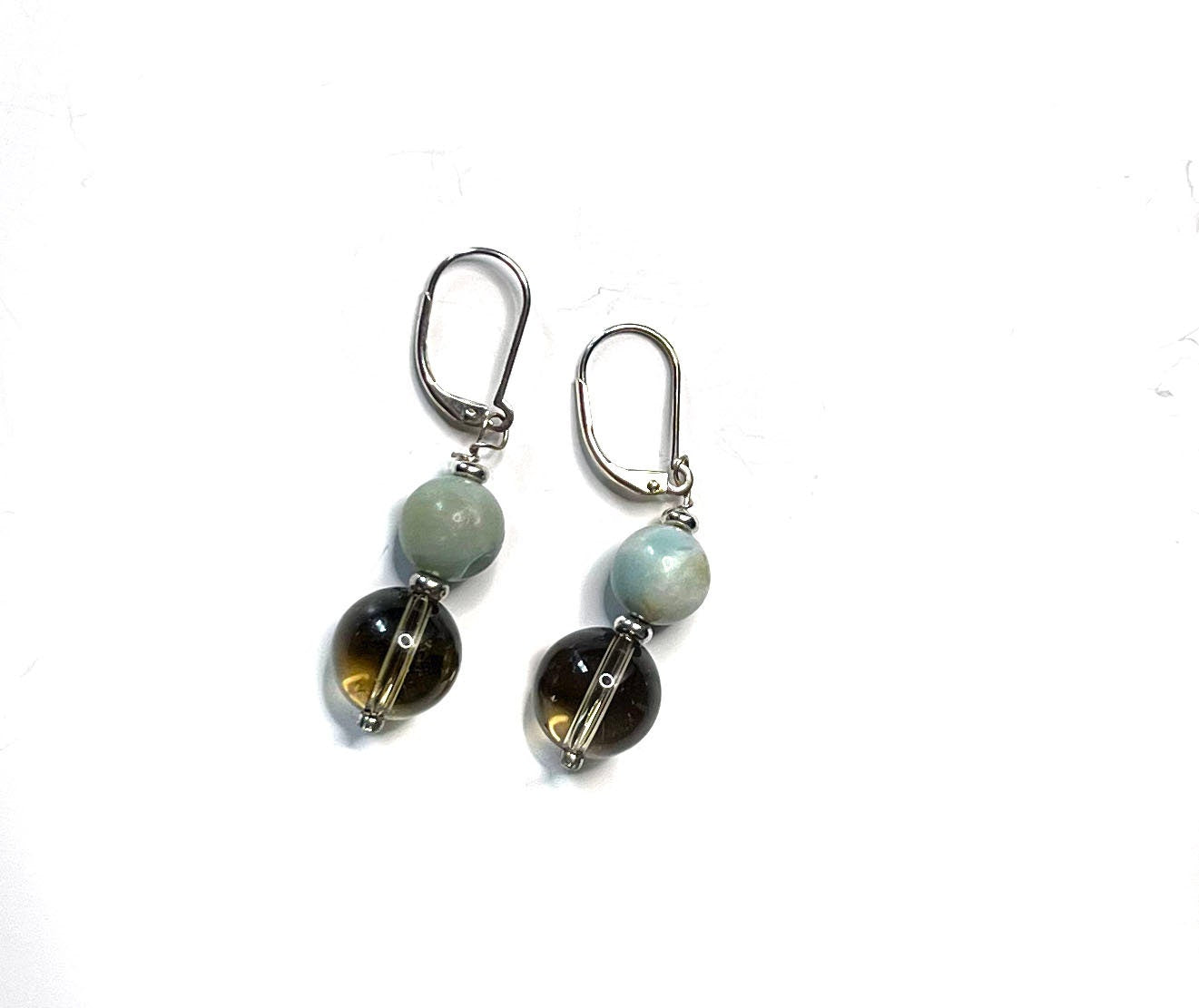 Artisan-designed Sacred Geometry Larimar and Smokey Quartz Earrings in 925 Sterling Silver, highlighting their unique craftsmanship.