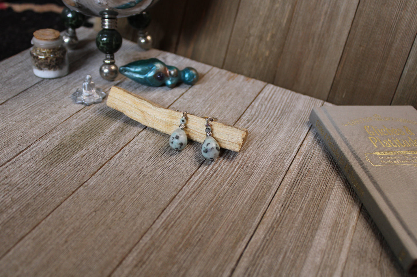 Close-up of Teardrop Earrings - sesame jasper minimalist jewelry with mint jasper and black tourmaline, artisan crafted in 925 Sterling Silver.