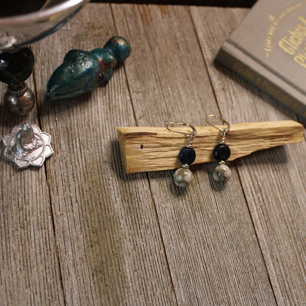 Close-up view of Rare Orbicular Jasper and Lapis Lazuli stone earrings showcasing the unique craftsmanship and natural beauty, suitable for zen style enthusiasts.