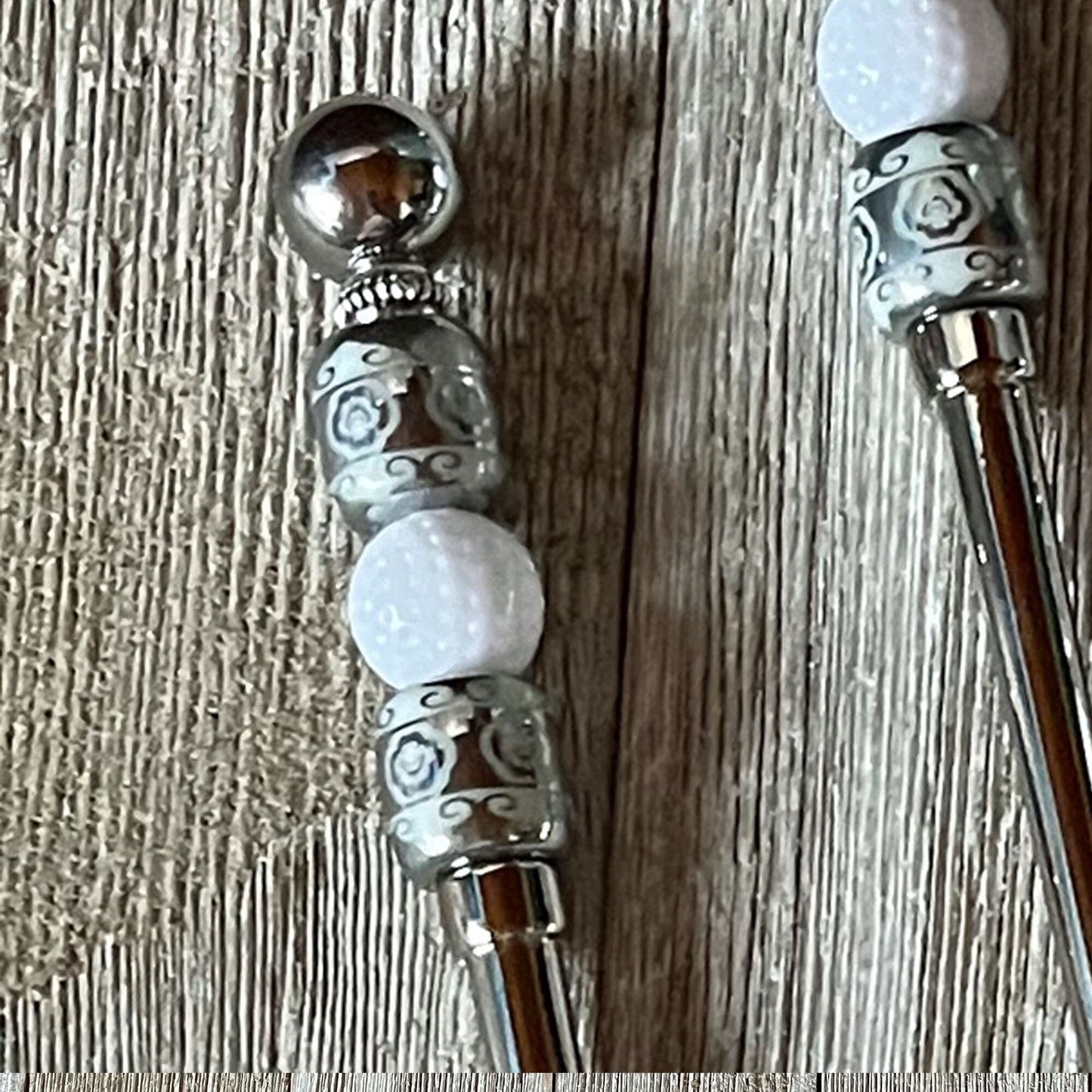 Close-up of the Golf Dip Knife - fun golfer gift, showcasing the detailed golf ball design and silver bead handle, ideal for entertaining.