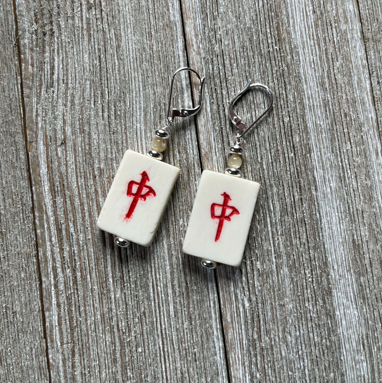 Vintage Mahjong Tile Earrings showcasing wind symbols and intricate designs, stylish accessory for Mahjong lovers.