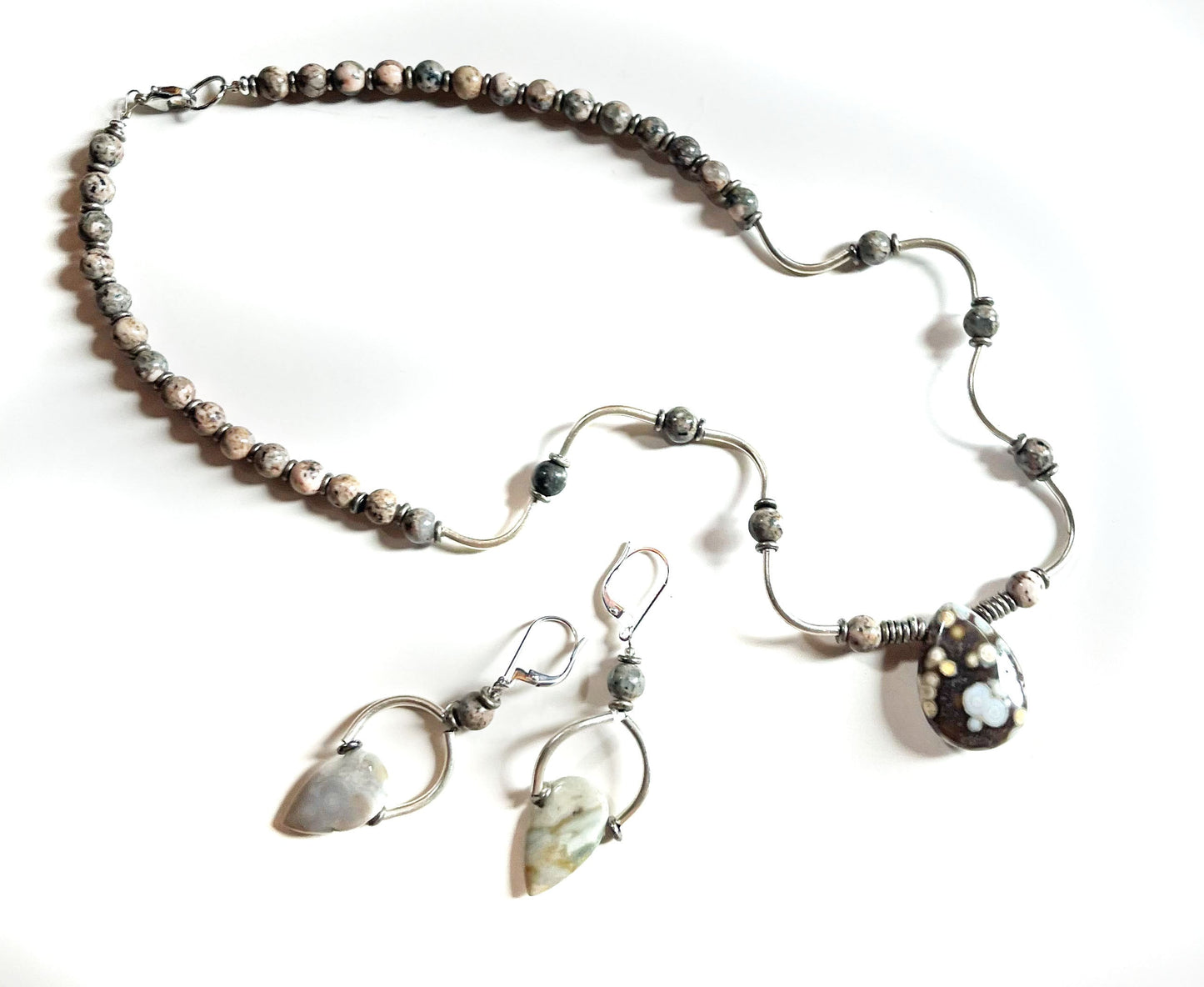Elegant Ocean Jasper Tear Drop and Wavy Sterling Silver Jewelry Set showcasing a unique design, perfect accessory for casual and formal occasions.