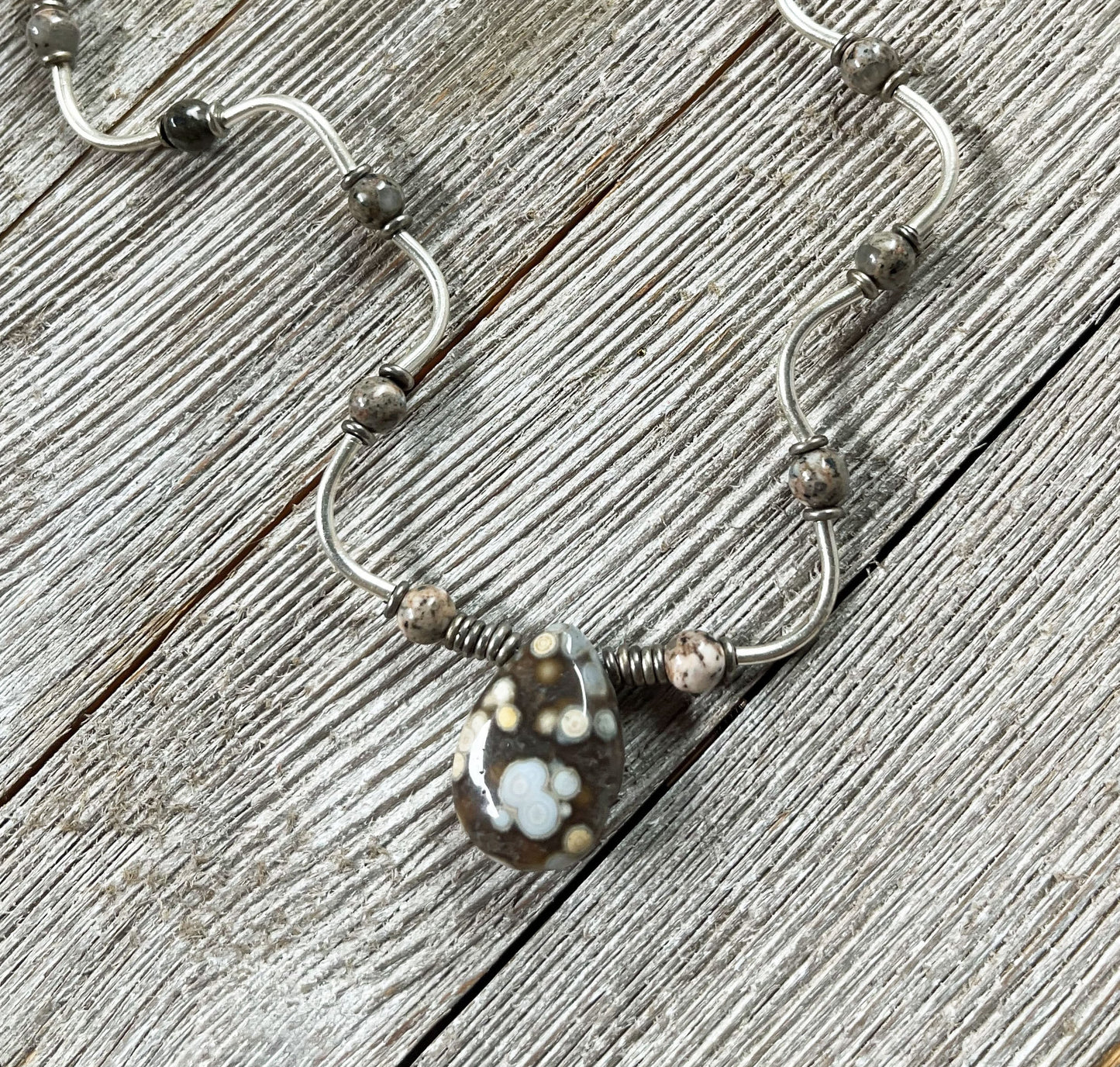 Ocean Jasper Tear Drop and Wavy Sterling Silver Jewelry Set featuring a stunning tear drop pendant and intricate wave patterns, ideal gift for self or nature lovers.