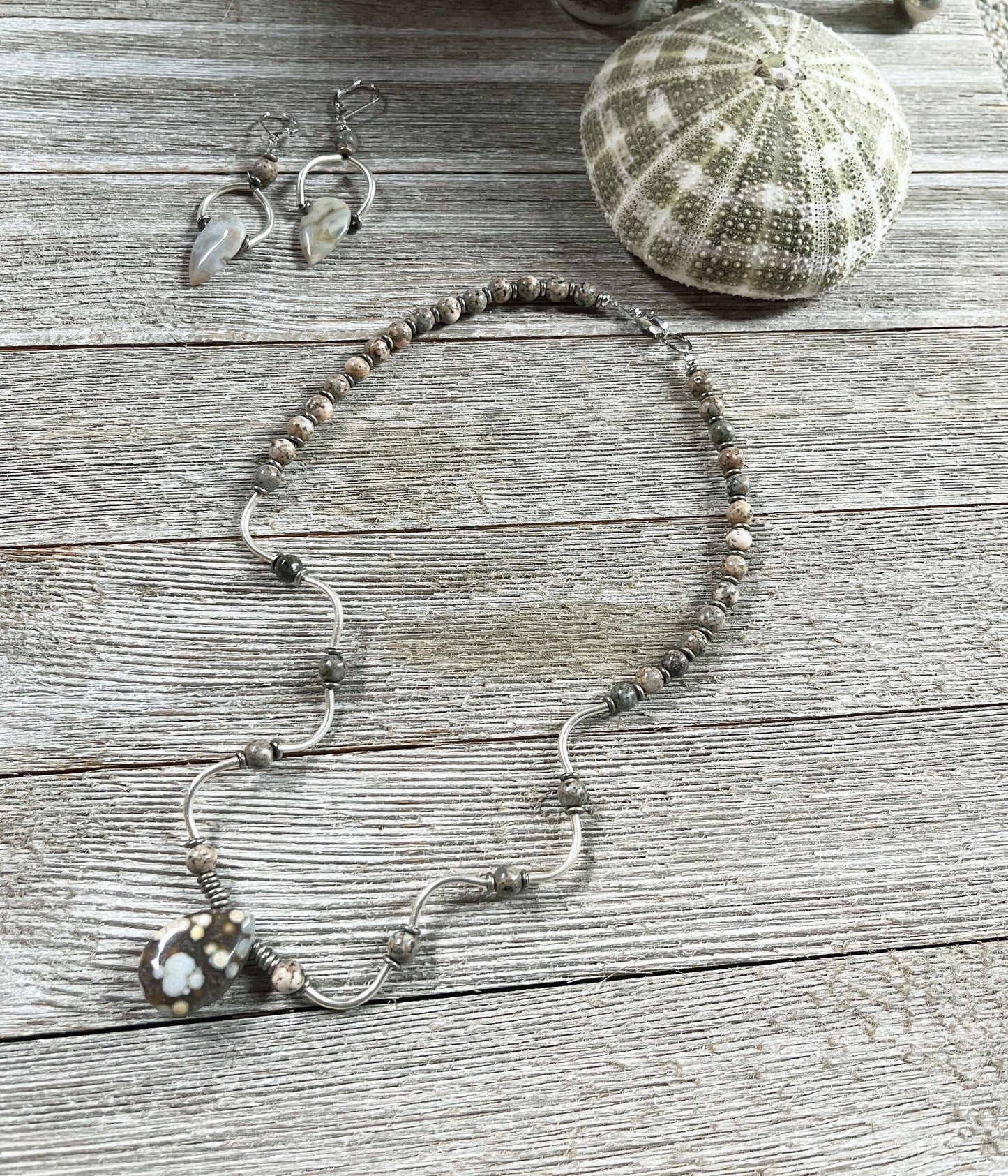 Model wearing Ocean Jasper Tear Drop and Wavy Sterling Silver Jewelry Set, showcasing its stylish design suitable for any occasion.