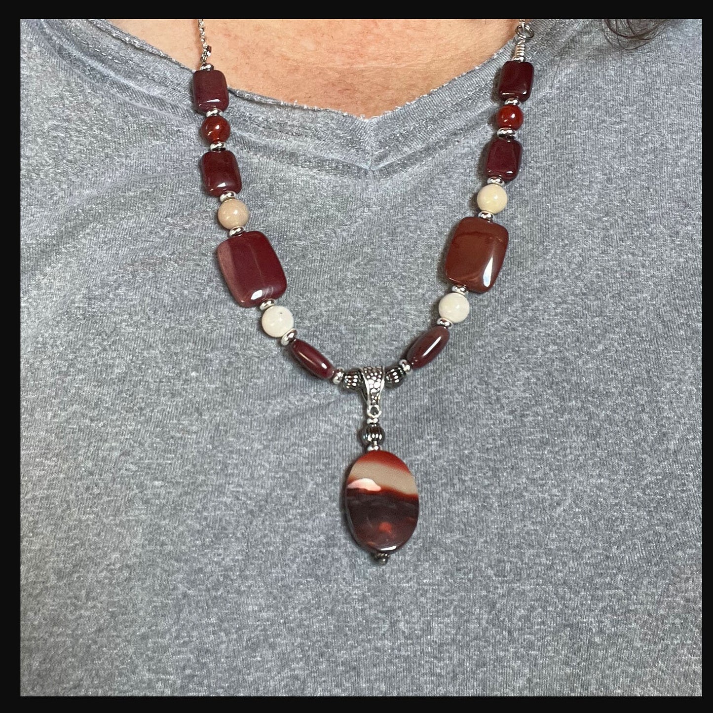 Moukaite Jasper Sunrise and Sunset Necklace and Earrings Jewelry Set on display, illustrating nature-inspired beauty.