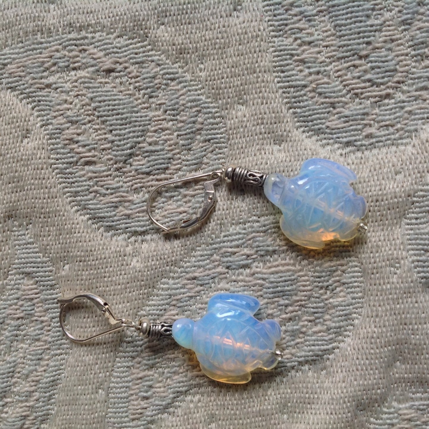 Stylish Sea Turtle Earrings with carved stone design, showcasing their charm as a gift for someone who loves turtles.