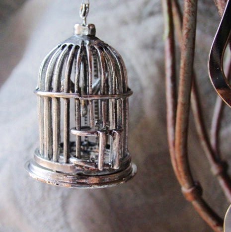 BIRD CAGE BOOKMARK - Feather Metal Bookmarker showcasing intricate silver bird cage design, a perfect gift for book lovers.