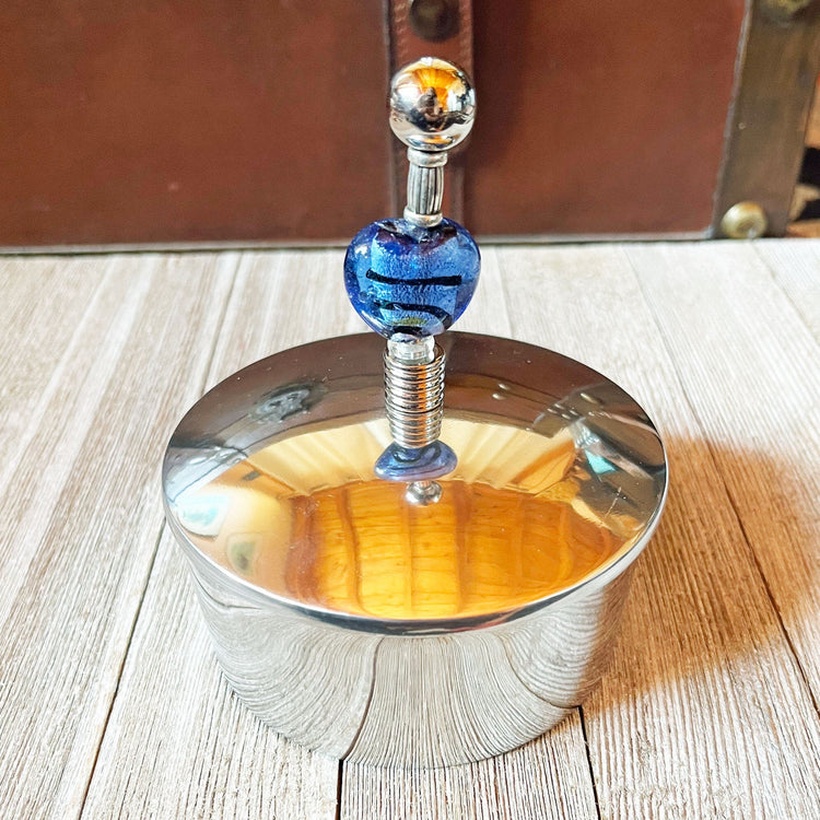 Home Decor ~ Enliven collection features a stylish trinket box adorned with blue foil heart glass beads, perfect as a romantic gift or unique desk decor. Elevate your living space with this charming accent piece.