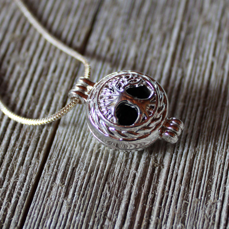 HEART AROMATHERAPY necklace featuring a lotus flower locket style, essential oil jewelry with a silver snake chain and lava bead for personal customization.