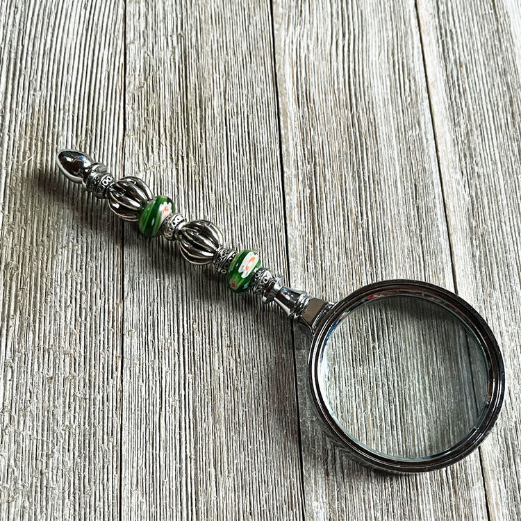Elegant Floral Green Bead Magnifying Glass from the Office Tools collection, featuring a stunning design with colorful beads, perfect for gifting or enhancing your workspace.