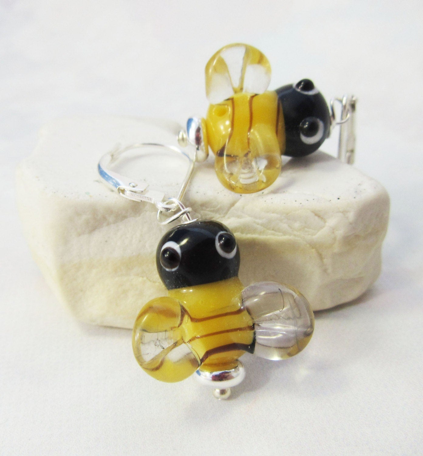 Charming Earrings featuring hand-crafted glass bee design, showcasing vibrant yellow and black colors. Perfect accessory for nature lovers, these playful earrings add a unique touch to any outfit in the Earrings collection.