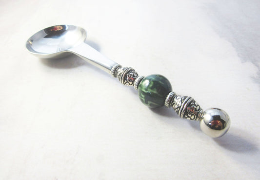The Green Stone Scoop & Table Spoon Gift Set features a handcrafted scoop with an ornate handle and a large dark green bead—ideal as a unique tea, coffee, bath salt, or herbal supplement measure spoon for enthusiasts.