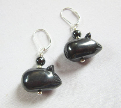 Close-up of hematite mice earrings showcasing their playful shape and sleek gray color, ideal for animal lovers.