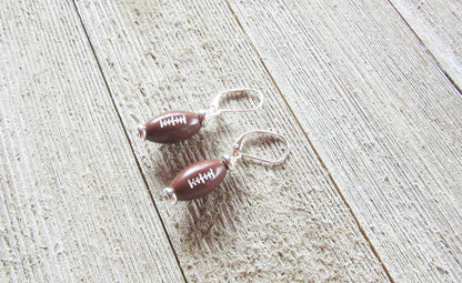 Football Novelty Earrings displayed elegantly, ideal for game day jewelry, capturing the spirit of cheering for your sports team.