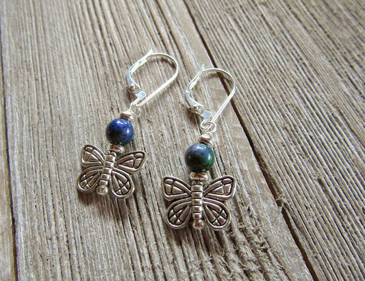 Butterfly Mood Bead Earrings: Color-Changing Animal Theme—silver earrings with blue and green accents, shown on rustic wood. Perfect for those who love animal jewelry that shifts color!.
