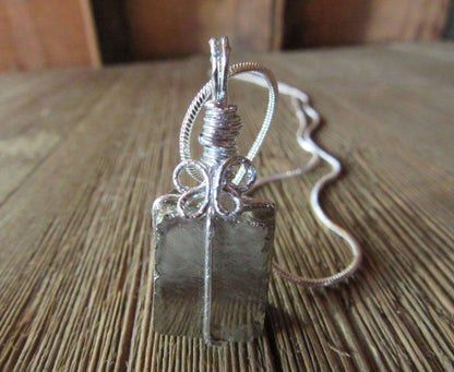 Stunning Pyrite Crystal Pendant in a chunky gold necklace design, showcasing the wire-wrapped choker, perfect for metaphysical and zen aesthetic gift.