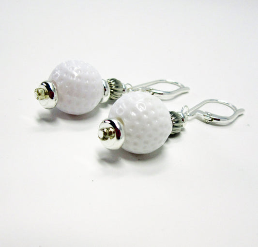 Golf Ball Lever Back Earrings: Novelty Jewelry Gift featuring white golf ball-textured beads with silver accents and secure hooks—an ideal accessory for golf jewelry enthusiasts.