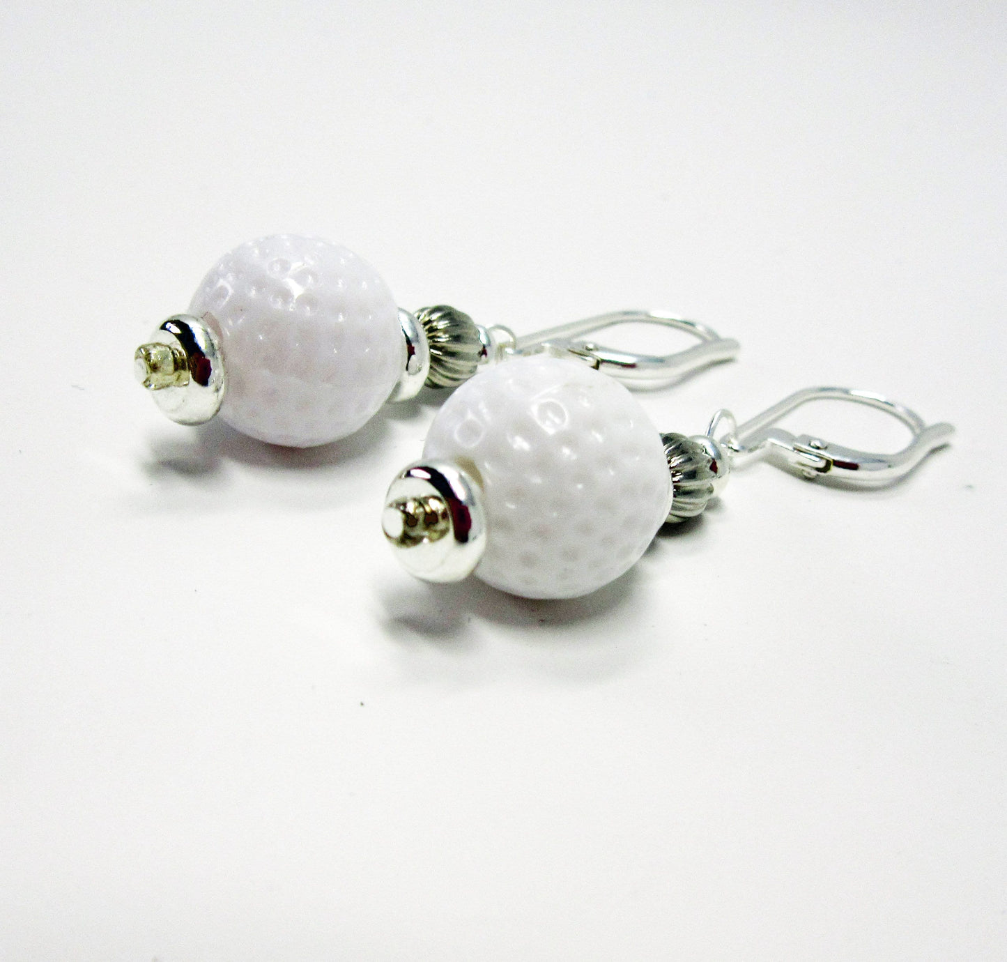 Golf Earrings a Gift for Woman Golfer. Golf Ball Jewelry a Fun Novelty. To wear while you putt around - not to tee you off