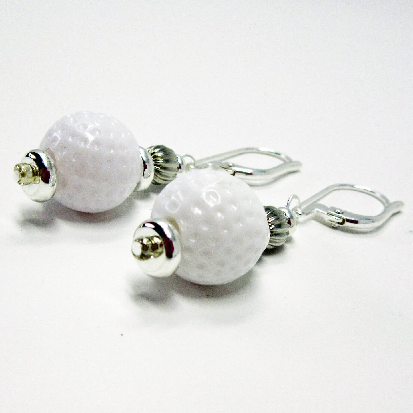 Golf Earrings a Gift for Woman Golfer. Golf Ball Jewelry a Fun Novelty. To wear while you putt around - not to tee you off