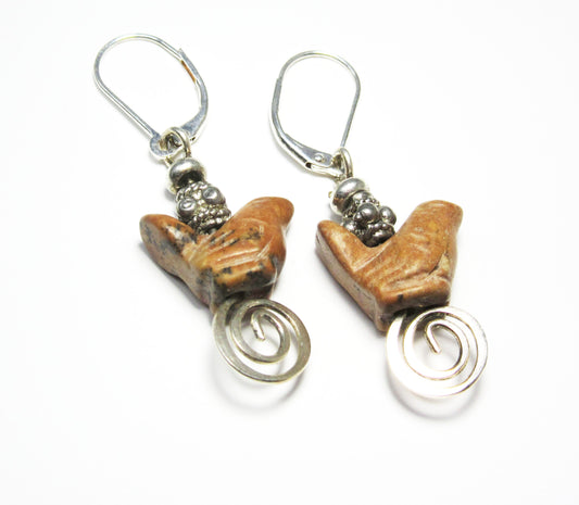 The Carved Jasper Songbird Earrings feature brown bird-shaped beads with silver accents and coiled wire dangles—an ideal handcrafted gift for bird lovers' jewelry collections. Displayed on a white background.