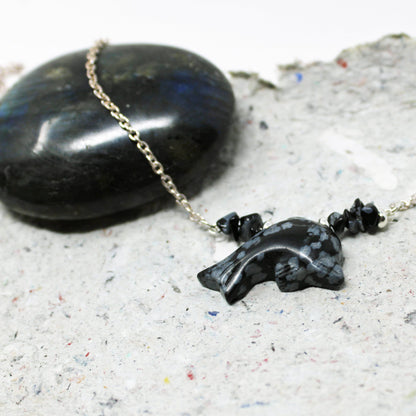 Close-up of Snowflake obsidian dolphin choker - Sea Life Necklace Gift showcasing intricate carving and ocean-inspired design, perfect gift for dolphin lovers.
