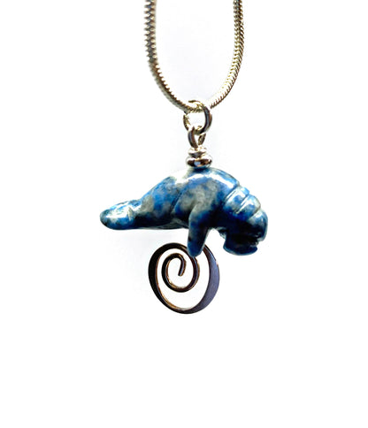 Manatee Blue Necklace displayed on a silver snake chain, perfect gift for animal lovers.