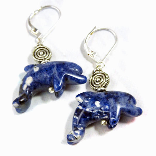 The Sodalite Dolphin Earrings: Sterling Silver Lever Backs feature blue and white dolphin-shaped stones and decorative silver accents, adding playful sea life charm and elegance to any outfit. Perfect for gemstone jewelry lovers.