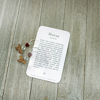 Horse Jewelry for Woman - jasper pony earrings displayed on a wooden background, showcasing their natural stone beauty and equestrian theme.