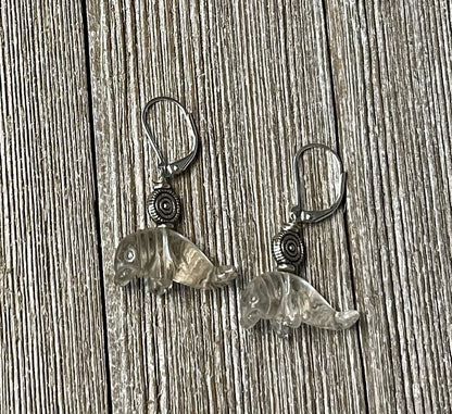 Manatee Earrings featuring clear quartz drop design, carved stone manatee jewelry, perfect ocean-themed gift for ocean lovers.
