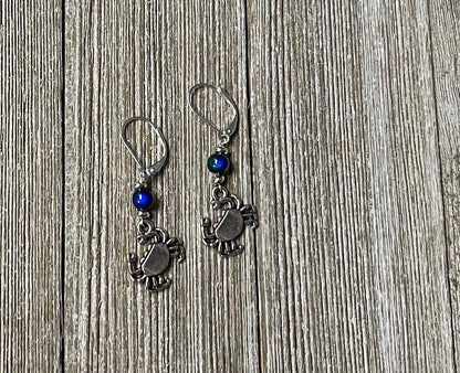 Detail of Color Changing Crab Dangle Earrings, featuring unique craftsmanship and ocean-themed elements.