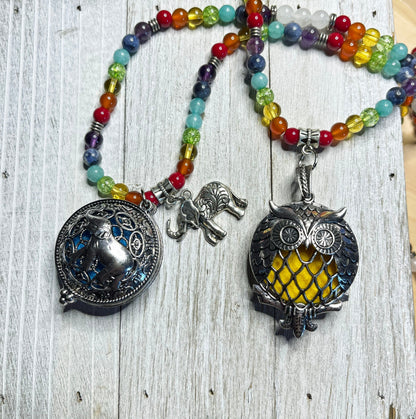 Aromatherapy Jewelry for Zen and Relaxation - Rainbow Quartz Mala Essential Oil Diffuser Necklace featuring an Owl locket for essential oils.