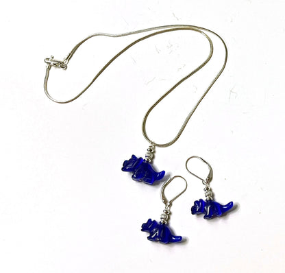 Close-up of Triceratops earrings - blue dinosaur jewelry with intricate details, ideal silly gift for a geeky friend.