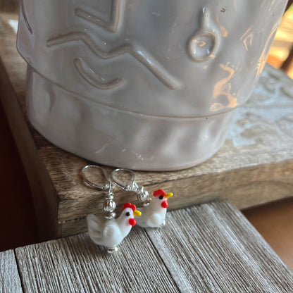 Hen Earrings Gift that is egg strodinary - white lamp work glass chicken jewelry showcasing farm aesthetic bird design perfect for barnyard keepers.