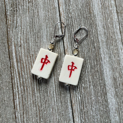 Vintage Mahjong Tile Earrings showcasing wind symbols and intricate designs, stylish accessory for Mahjong lovers.